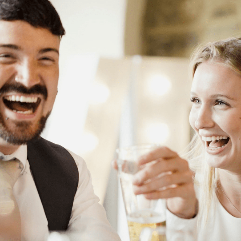 Another happy couple loving their wedding comedian
